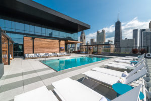 Outdoor swimming pool and lounge chairs